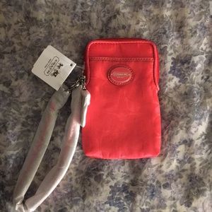 Coach phone case or change wristlet